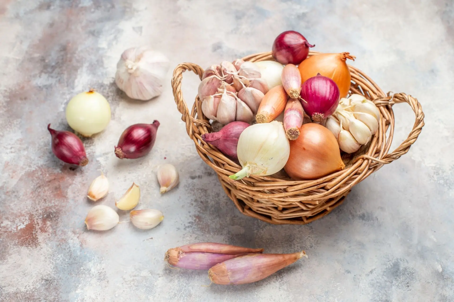 front-view-different-ingredients-onions-garlic-inside-basket